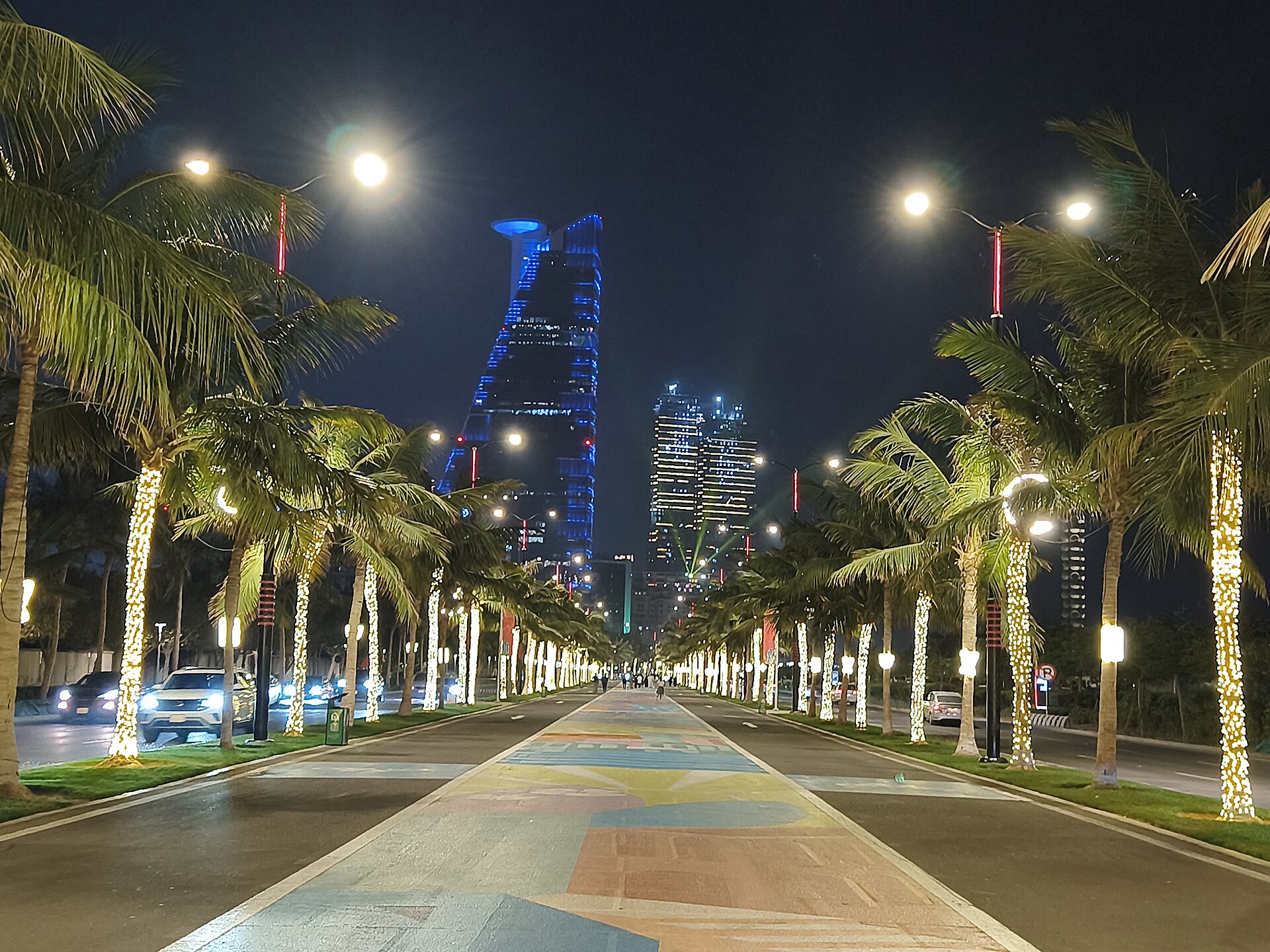 Palm-lined avenue in Jeddah at night