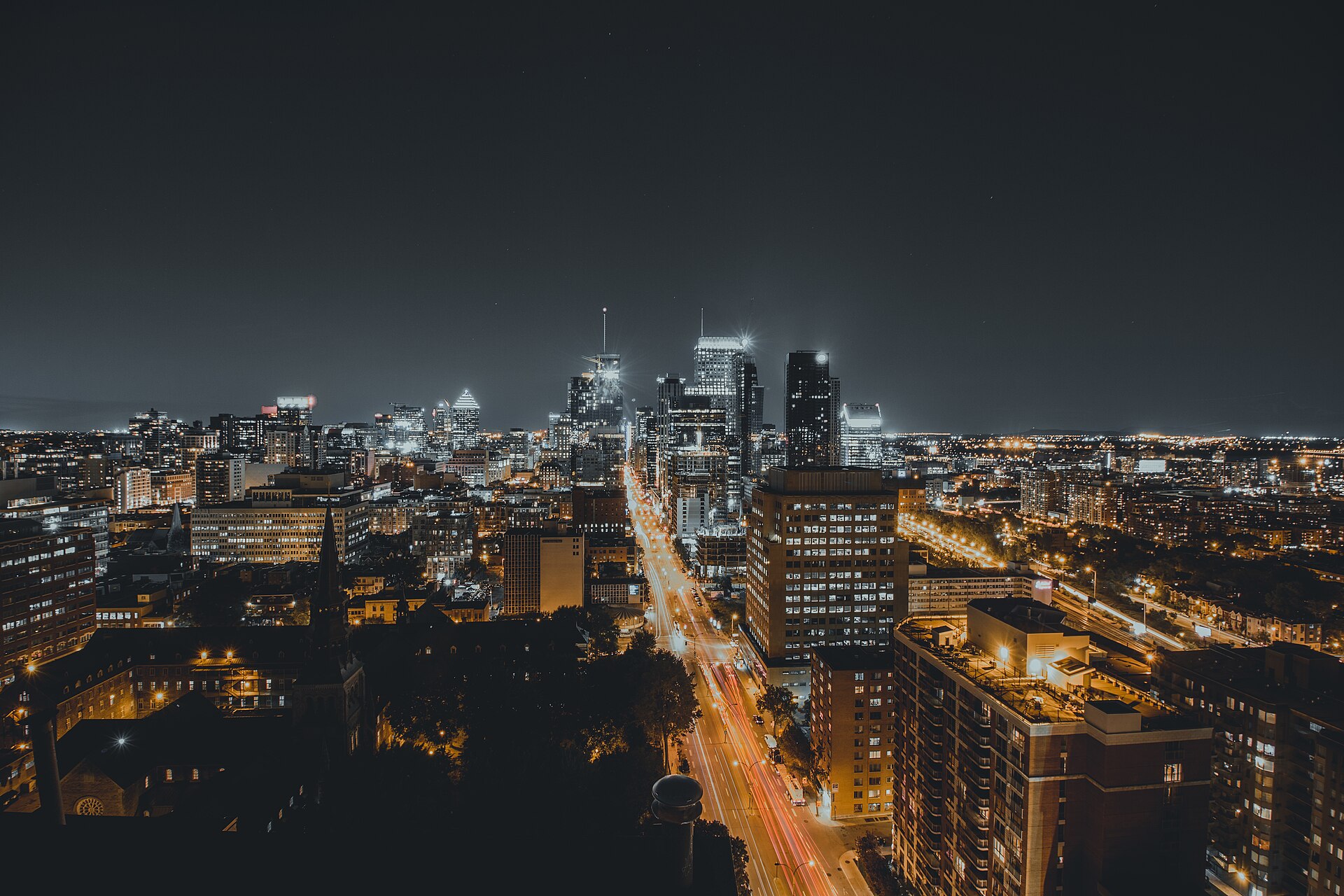 Downtown Montréal skyline lit up at night